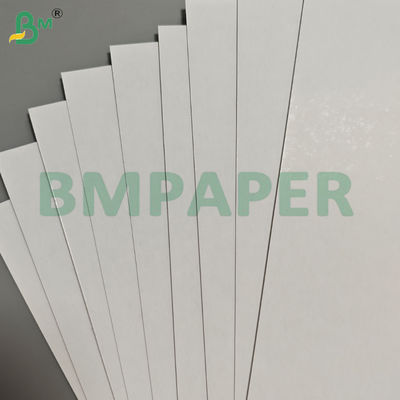 320gsm 330gsm C2S Black Core Two Side Glossy Magic Paper Sheets